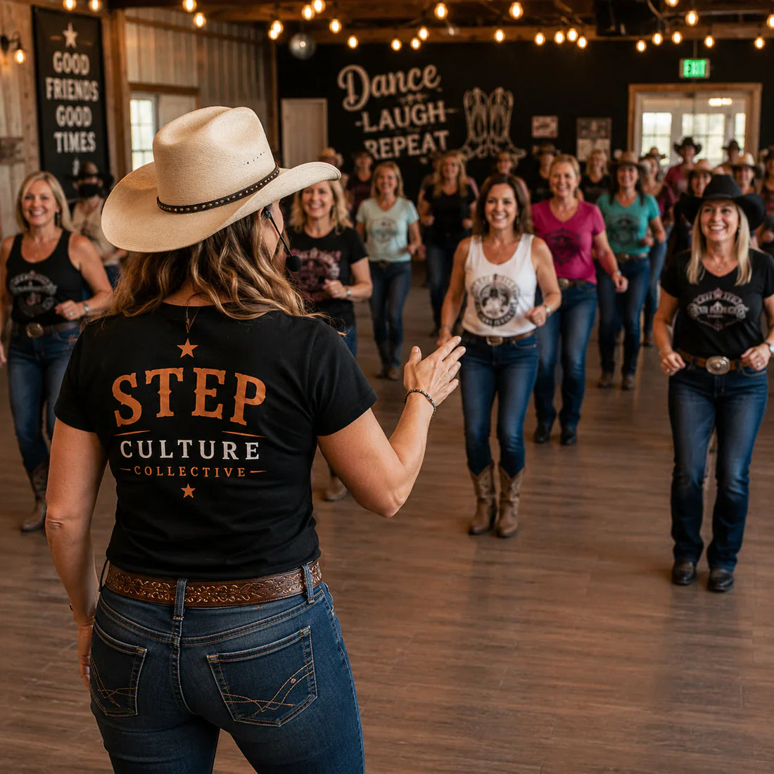 Line dancers learning together in a country dance studio