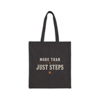 Close-up of the black cotton tote and printed Step Culture Collective logo.