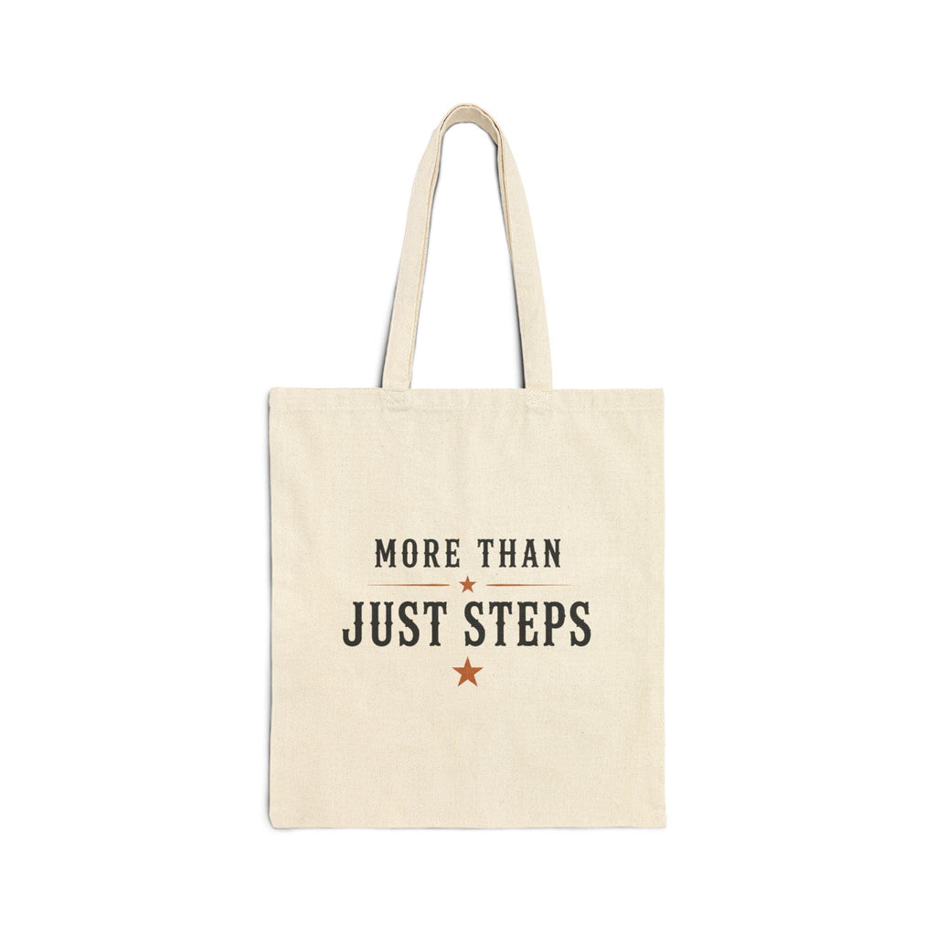 Close-up of the natural cotton tote and printed Step Culture Collective logo.