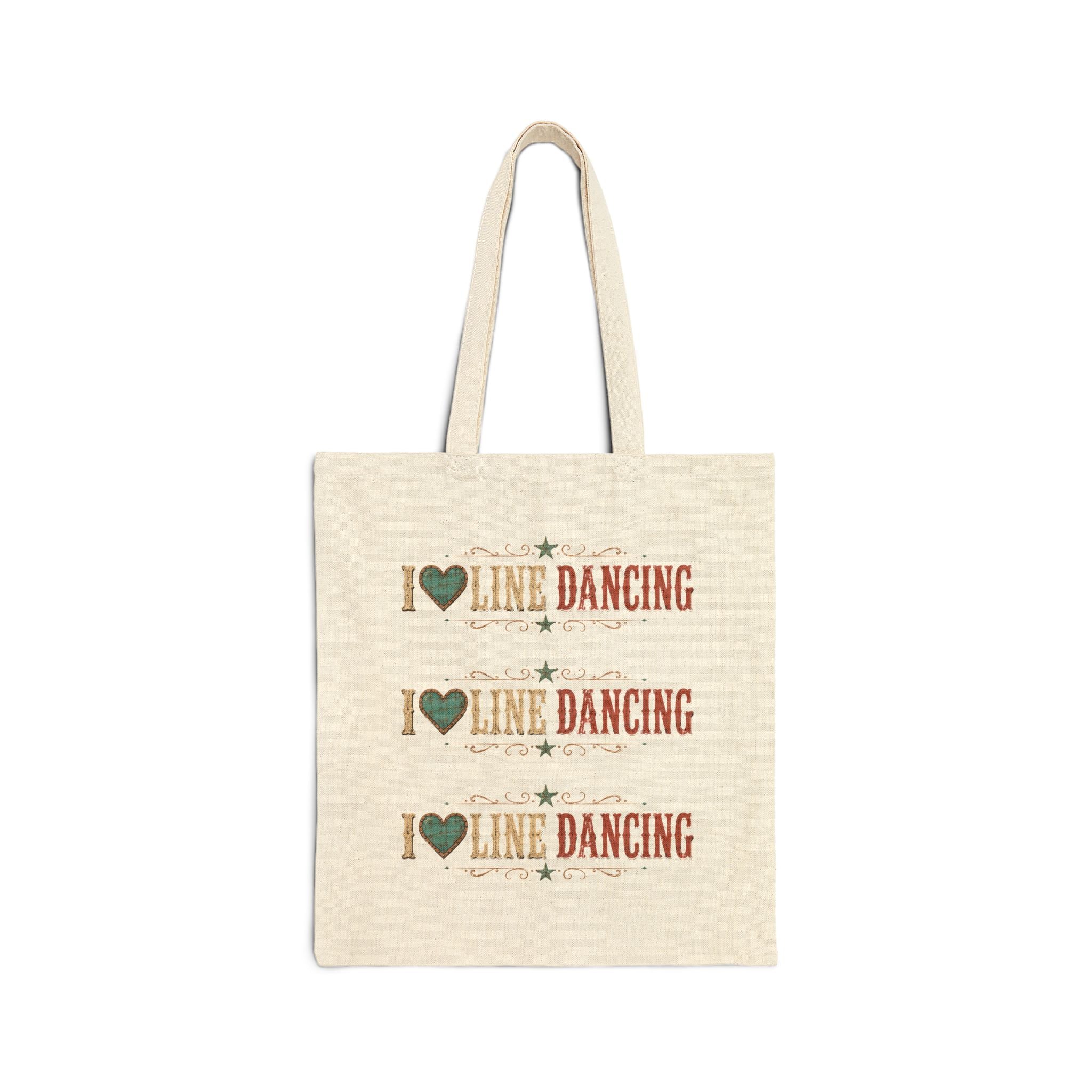 Close-up product mockup of the black canvas tote and its rustic line dancing print.
