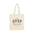 Natural canvas tote bag with Step Culture Collective branding on a clean product background.