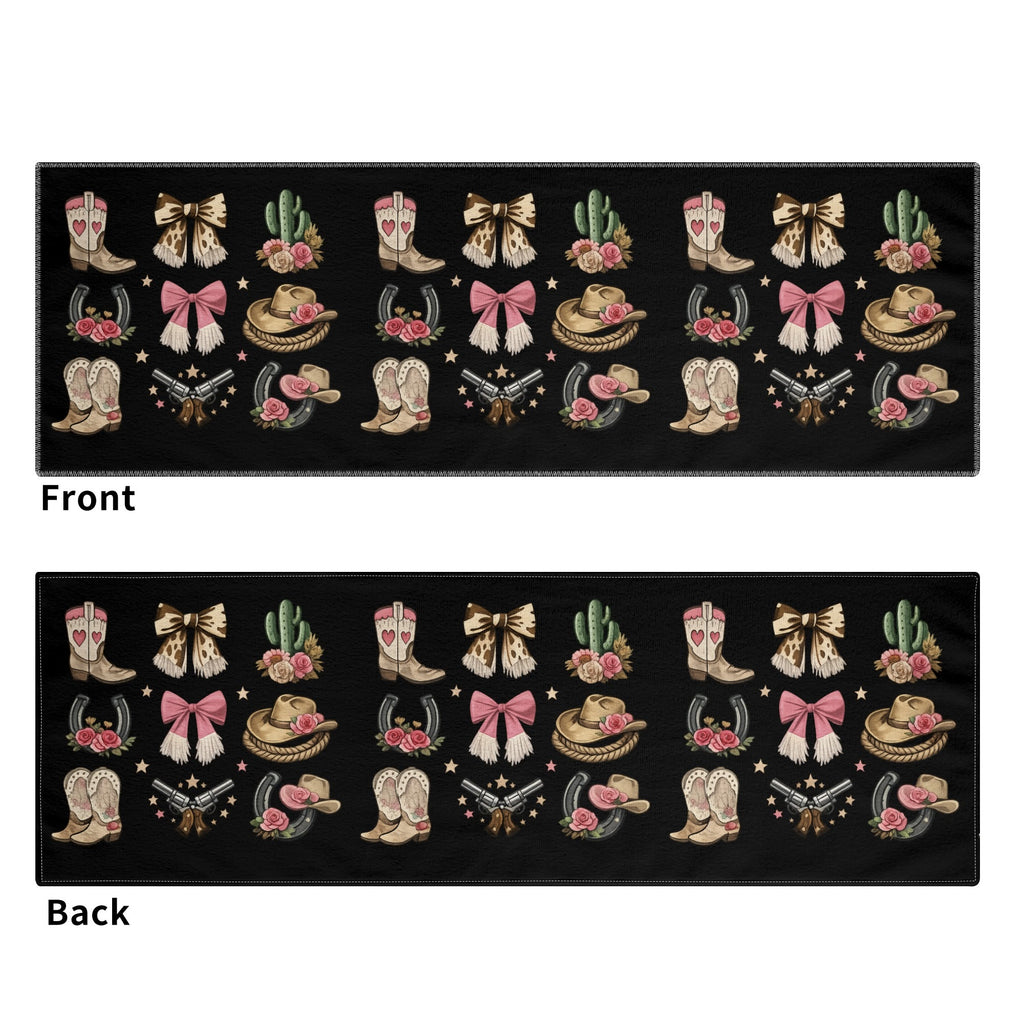 Front and back of black western cowgirl sports towel with pink boots, bows, hats and floral icons