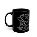 Just Boot Scootin black ceramic mug shown from the opposite side