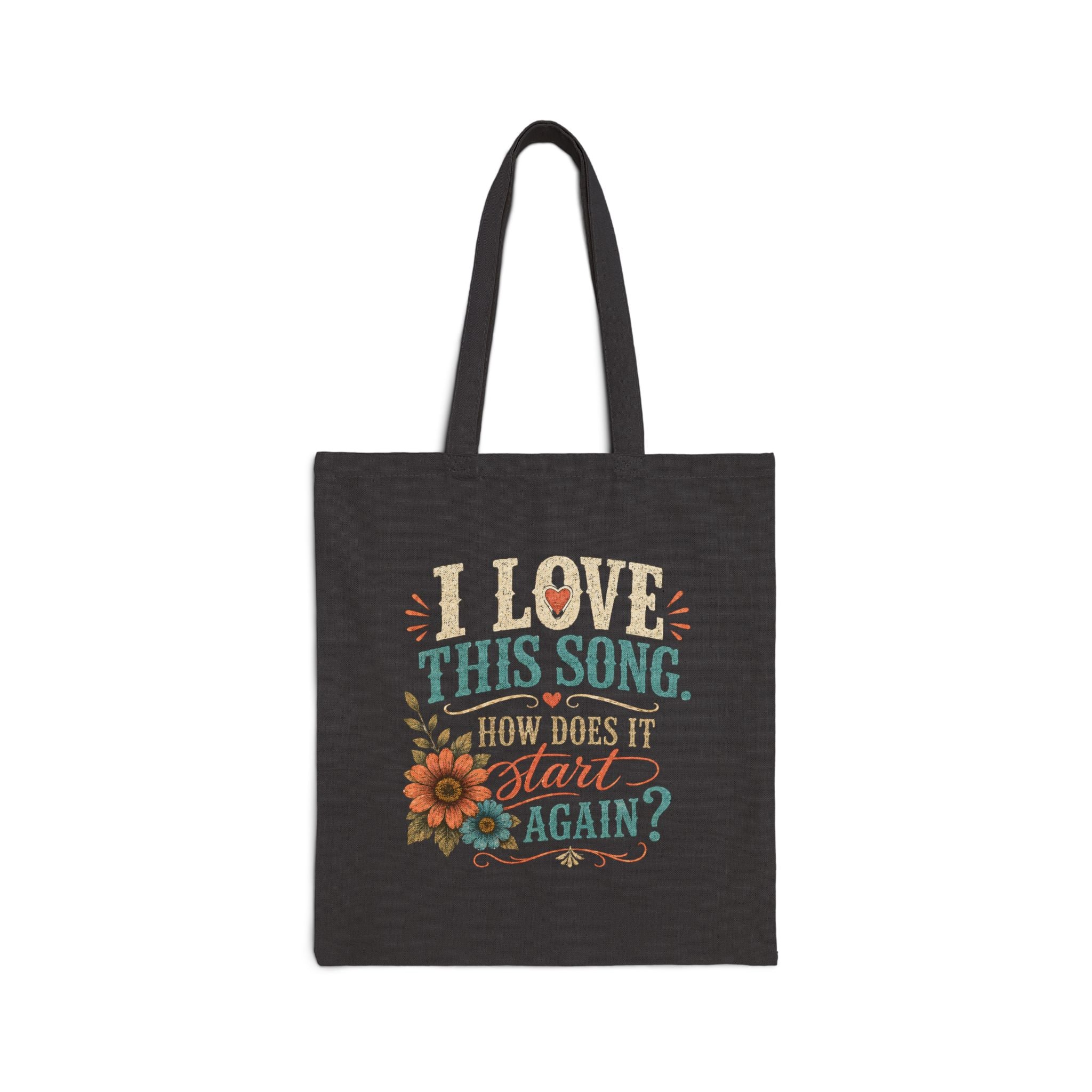 Front product mockup of the black canvas tote with vintage western boots, florals and humorous line dancing text.