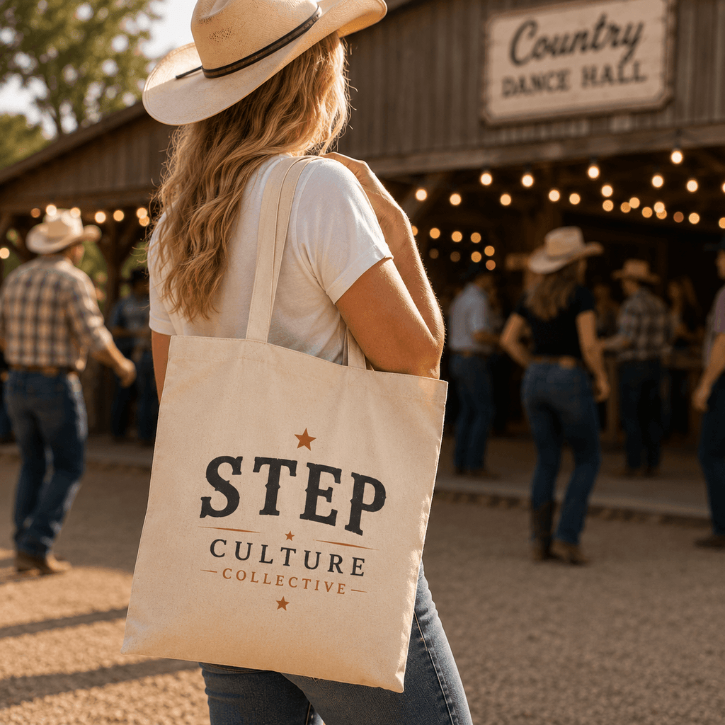 Front view of the natural canvas tote with the Step Culture Collective logo.