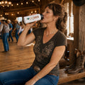 Line dancer drinking from an I Love Line Dancing personalised stainless steel water bottle