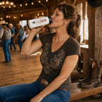 Line dancer drinking from an I Love Line Dancing personalised stainless steel water bottle