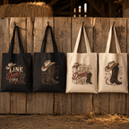 Natural and black ‘It’s Line Dance Time’ tote bags displayed on a rustic fence.