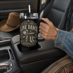 Live Love Line Dance 40 oz tumbler with one handle held by a mature woman during a country road trip