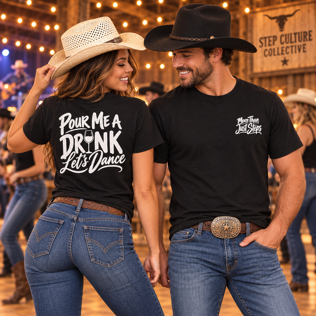 Male and female line dancers in black Pour Me a Drink Let’s Dance T-shirts showing front More Than Just Steps chest print and large back print