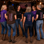 Line Dance Cowgirl T-shirt lifestyle image showing the pink Western line dance graphic on Gildan 5000 tees in black, purple, navy and brown.