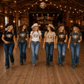 Line dancer wearing the longhorn skull and floral western graphic T-shirt