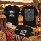 Front, back and sleeve views of the black Step by Step line dancing T-shirt displayed on a rustic fence