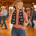Woman using a black western cowgirl quick-dry towel after line dancing