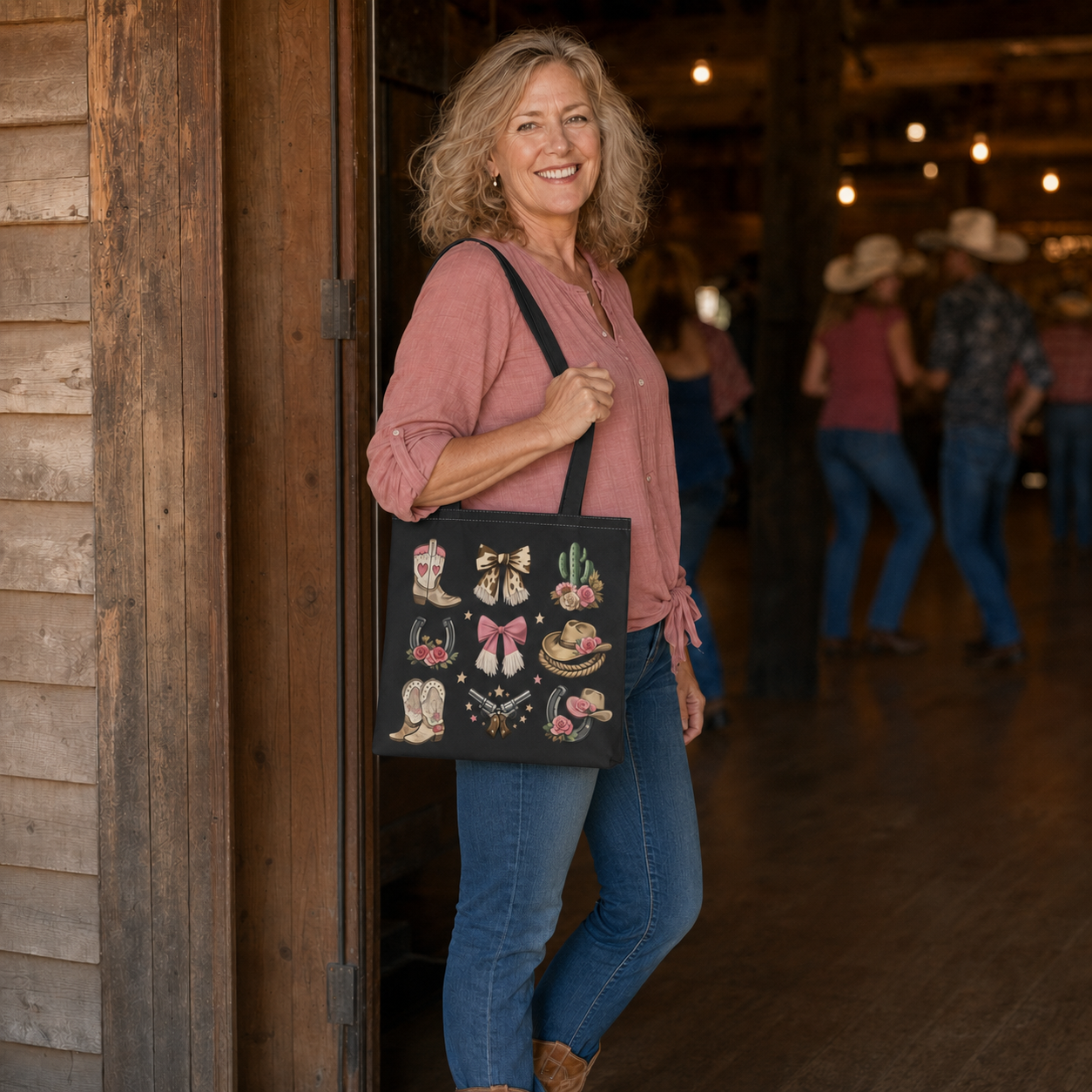 Mature woman carrying a correctly scaled black western cowgirl tote bag at a line-dancing hall